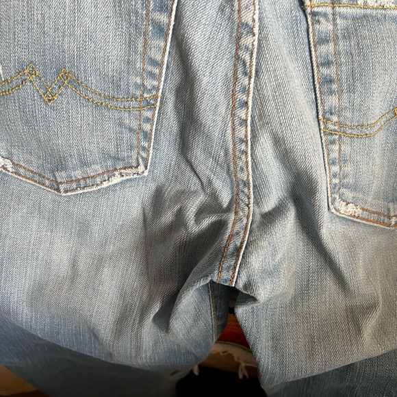 Lucky brand jeans. Size 4 length 27. Slightly distressed and flared - Picture 8 of 9